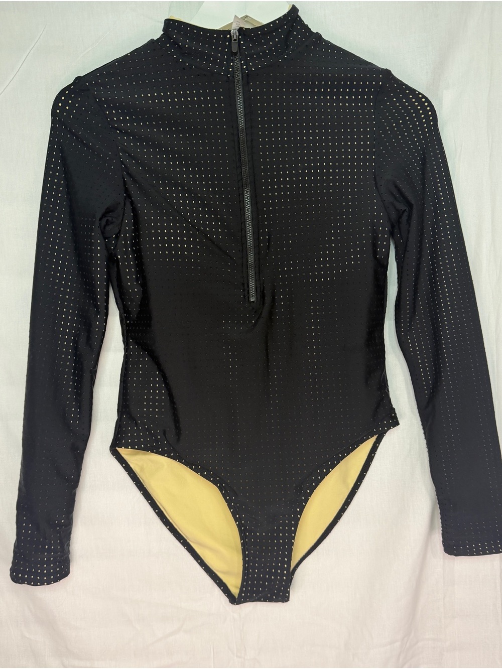 Fabletics Black Long-Sleeve Zip Front One-Piece with Subtle Dot Detail